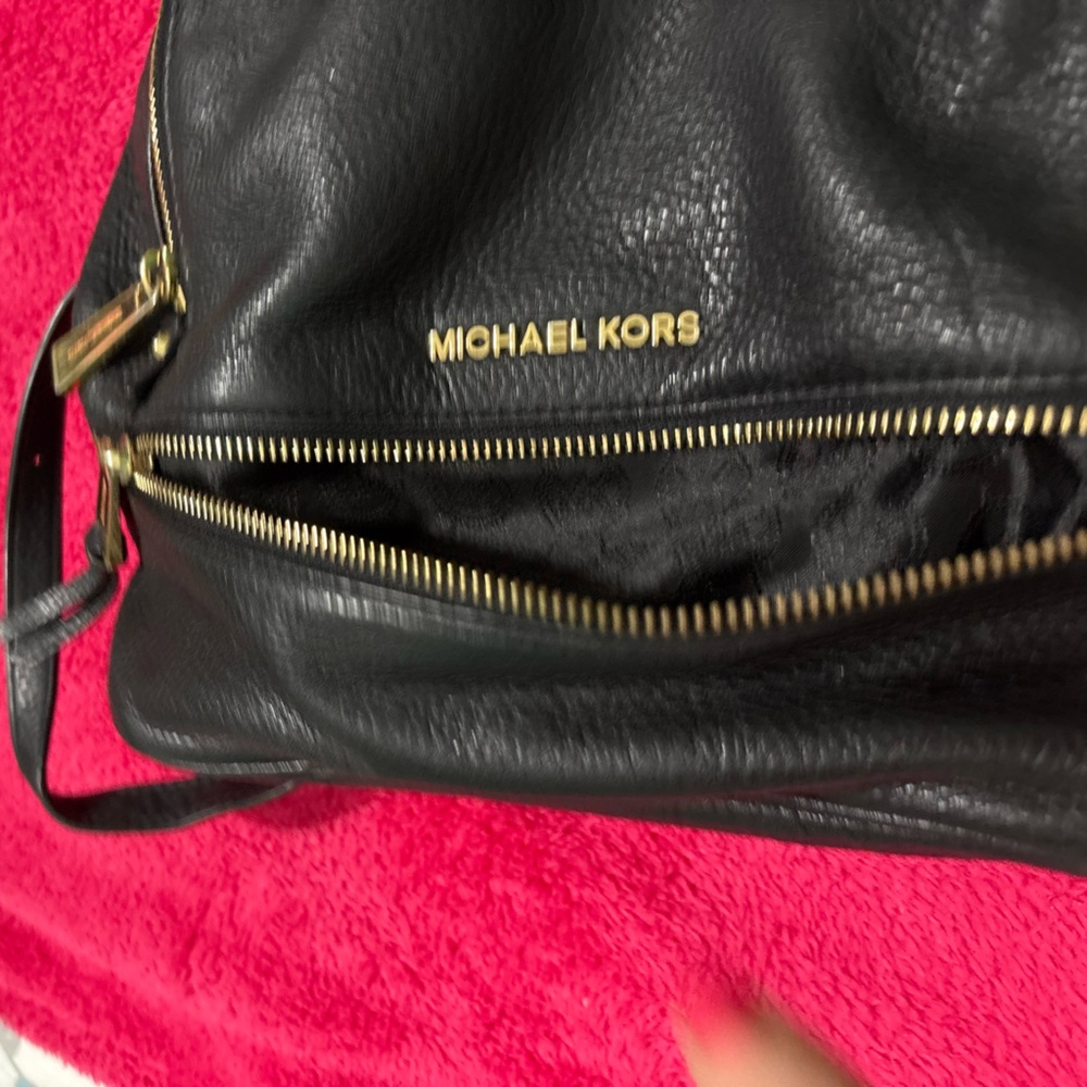 Michael Kors Black Leather Backpack with Gold Accents - Picture 8 of 10